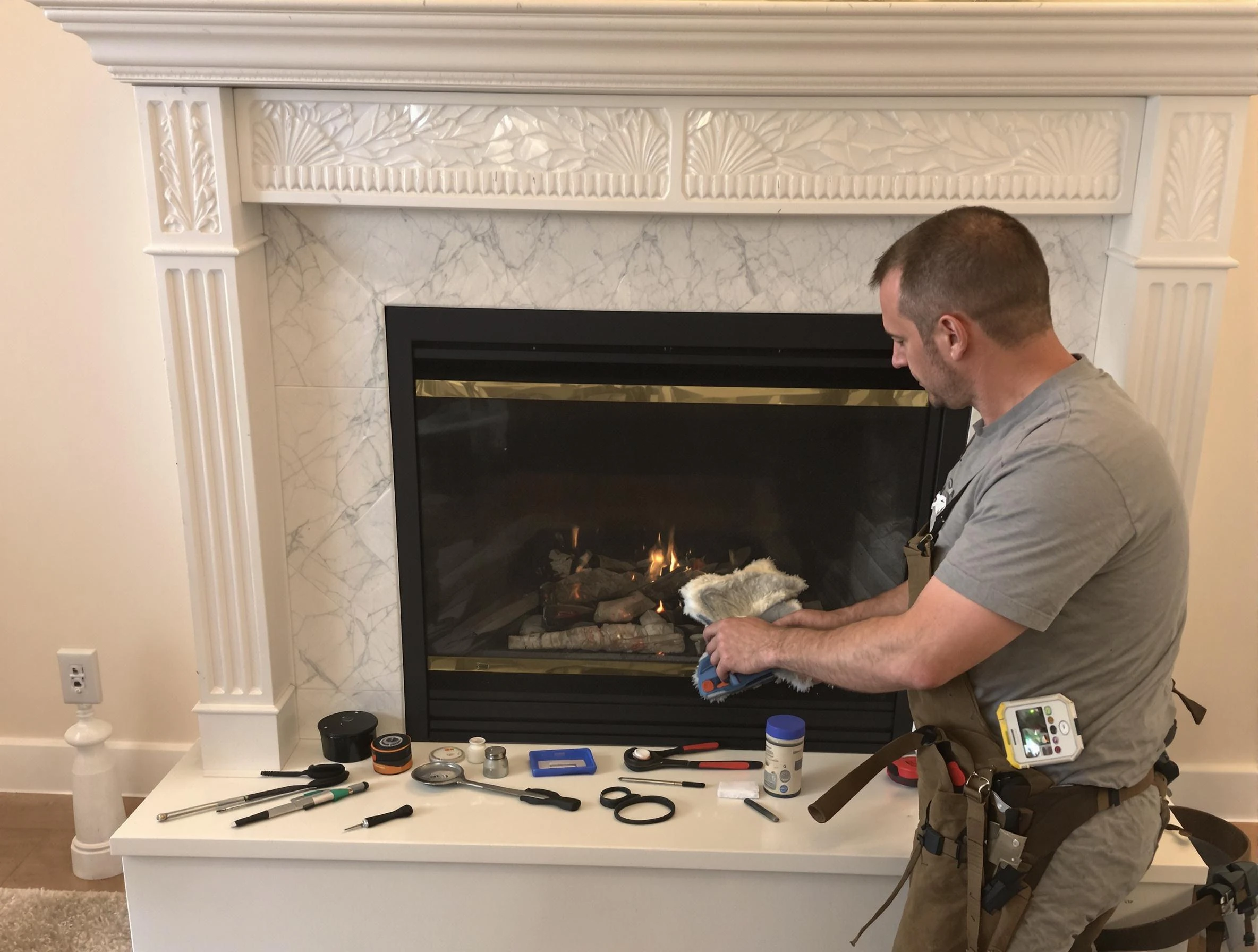 Billerica Chimney Sweep performing fireplace maintenance in Billerica, MA